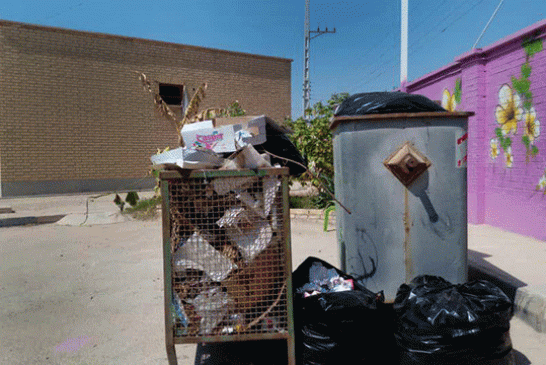 امتناع شهرداری گناوه از دفع زباله‌های مدارس گناوه